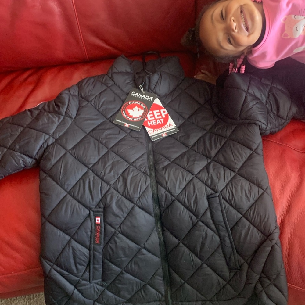 This is a NEW XL winter coat made by Canada winter gear. It’s black and warm.